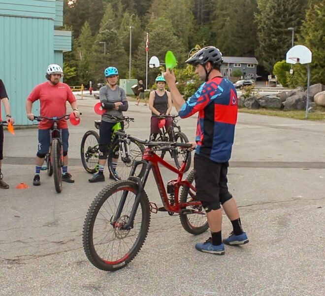 A group of riders taking a Foundations Blue level mountain bike clinic in Squamish