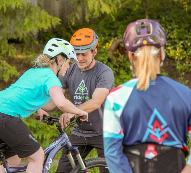 Riders working on their stability and balance during a Foundations Starter mountain bike clinic in Squamish