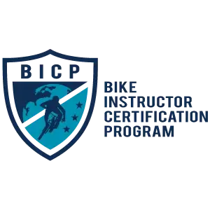 Logo of the Bike Instructor Certification Program (BICP) featuring a cyclist and stars inside a shield, capturing the spirit of mountain biking in Squamish.