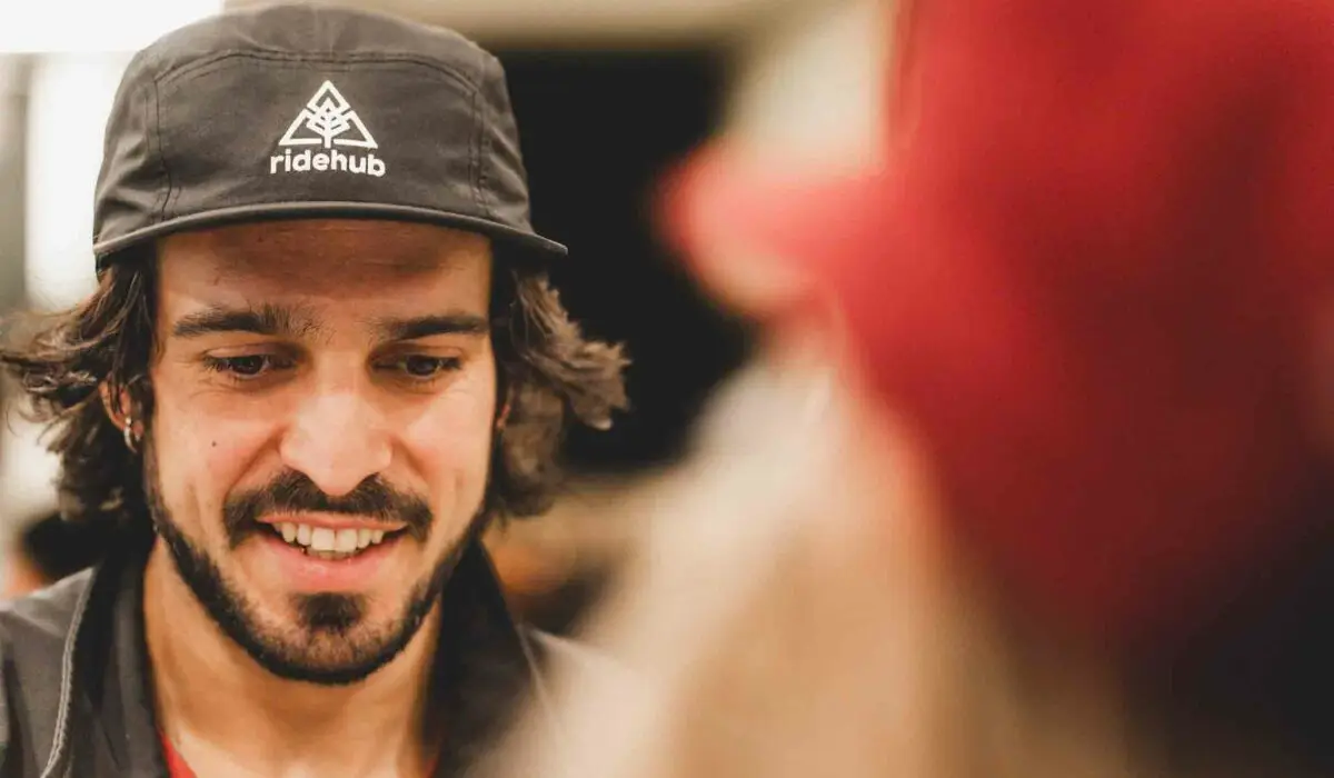 Shop 6 Man wearing a black cap with the
