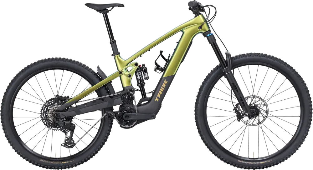 A modern full-suspension electric mountain bike with a green and black frame, wide knobby tires, and disc brakes.